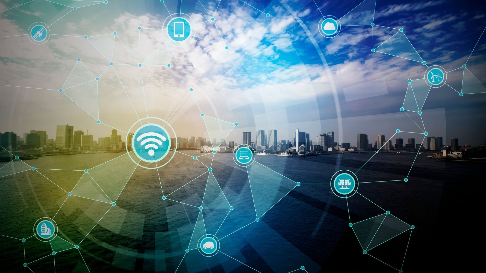 Digital technology network graphic overlaying a city skyline and waterfront, featuring connected icons for Wi-Fi, mobile devices, cloud computing, renewable energy, and smart technology systems.